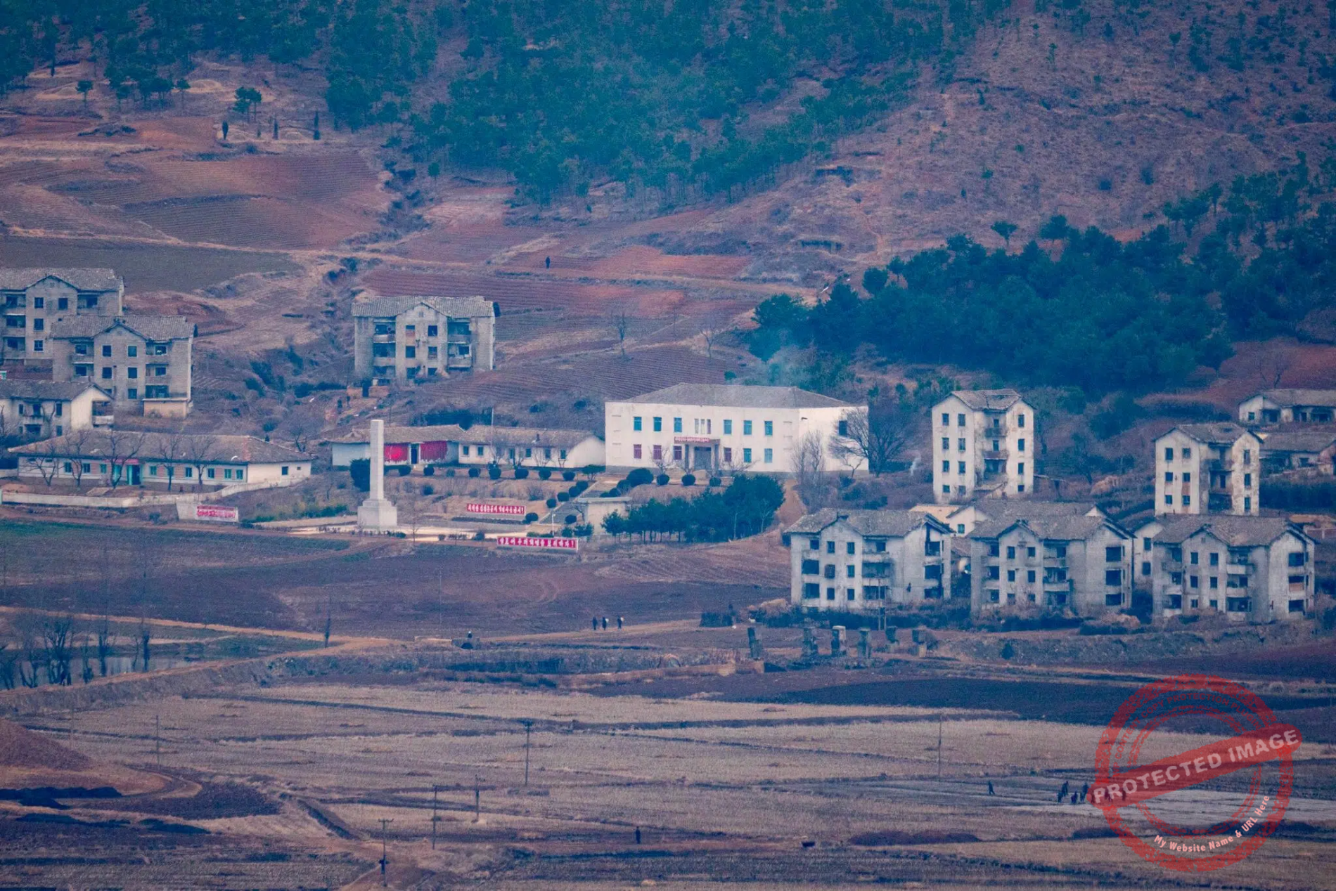 aegibong-haemulseonjeon-village-north-korea The North Korean village of Haemulseonjeon seen from the Aegibong Observatory (February 2024).