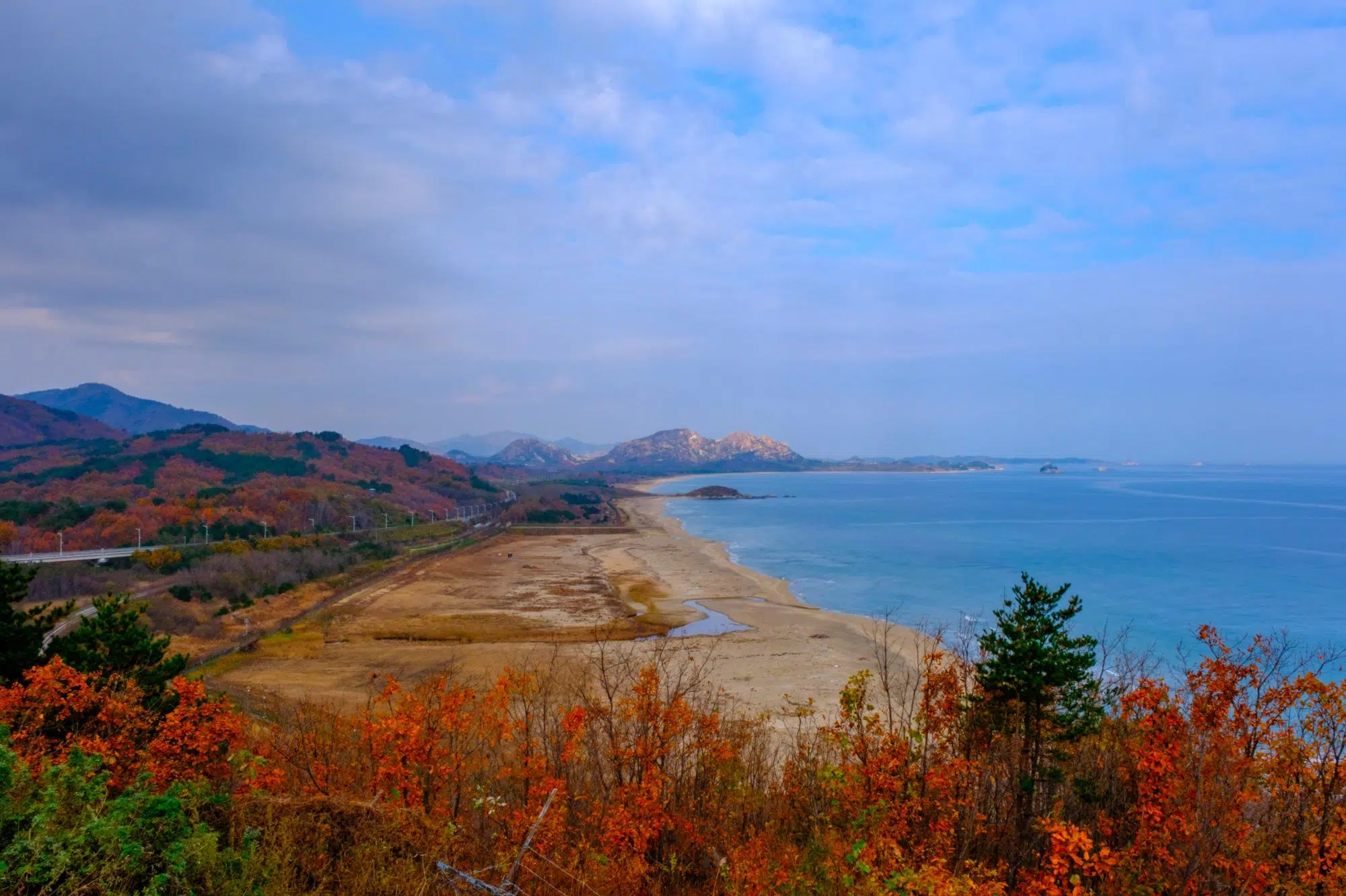goseong-dmz-east-sea-korea-autumn The end of the DMZ and the beginning of the maritime border, as seen from Goseong Observatory in May 2025.