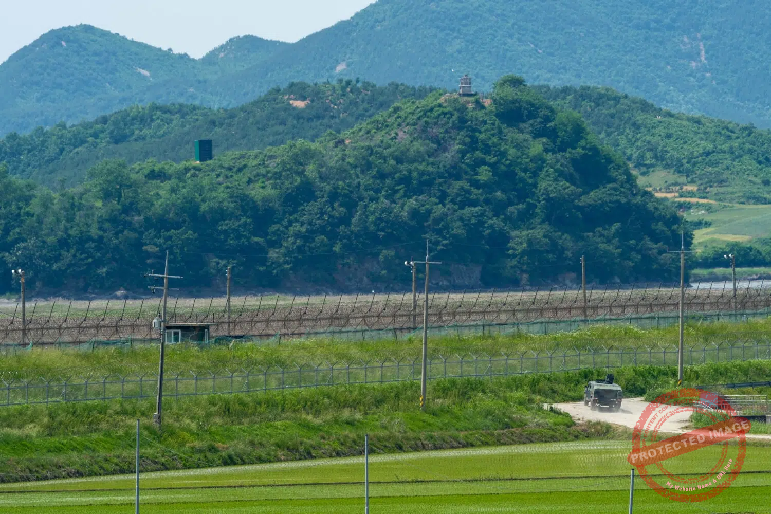 jayu-ro-june-2025-01 A South Korean military vehicle patrols near the border fence with North Korea (June 2025).