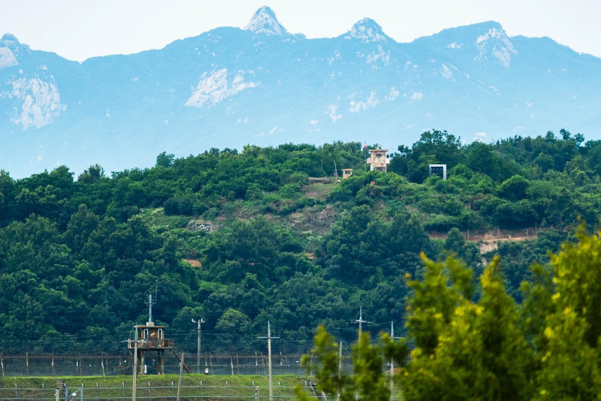 jayu-ro-north-korea-gp-dmz Seen from Jayu-ro, a North Korean guard post in the DMZ overlooks a South Korean watchtower across the border (June 2026).