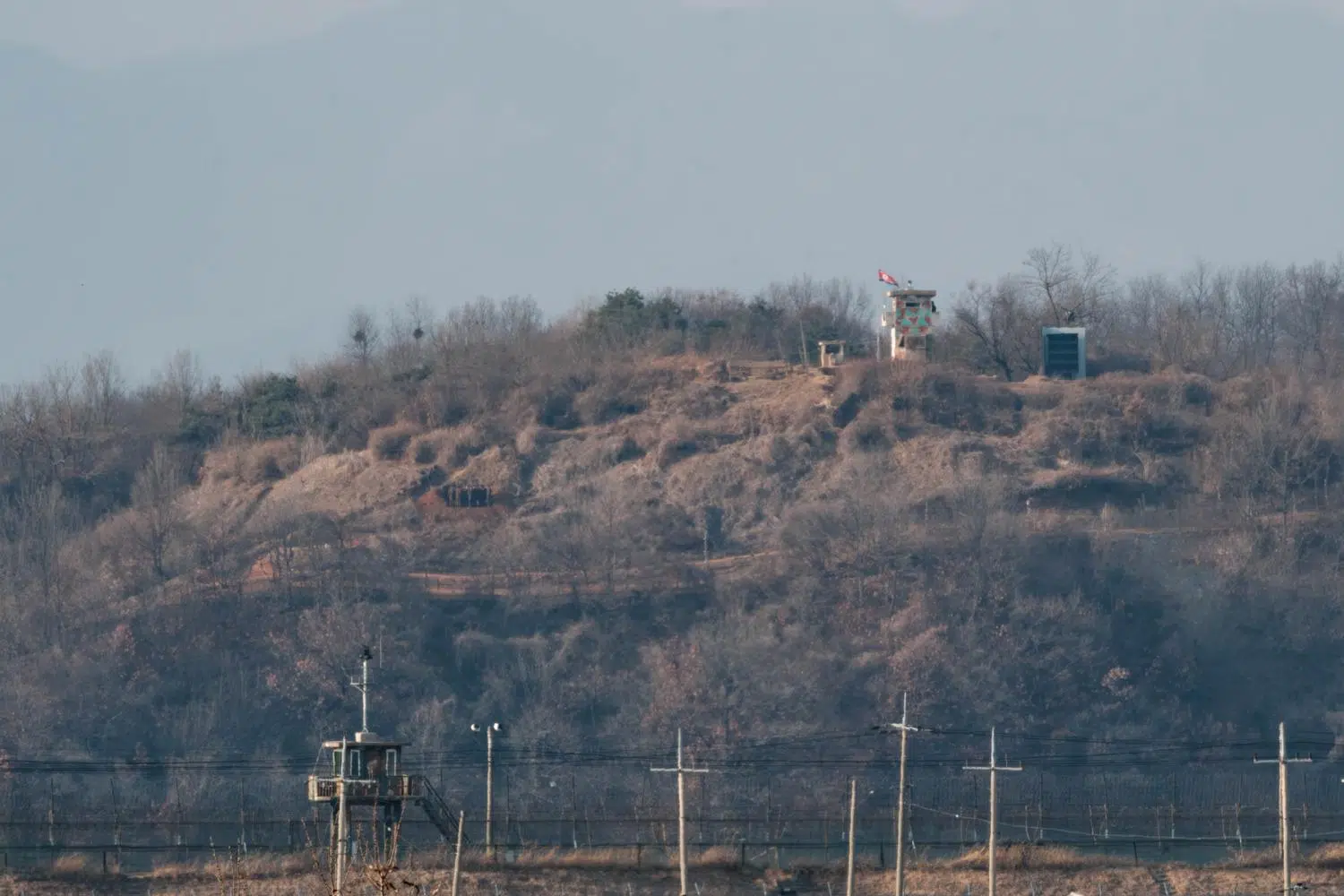 A North Korean watch tower overlooks a South Korean one across the border near Paju (February 2025).