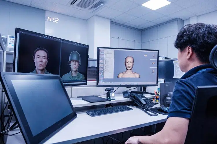 A scientist uses computer technology to reconstruct the face of a soldier from the Korean War whose bones were found on a former battlefield in South Korea.