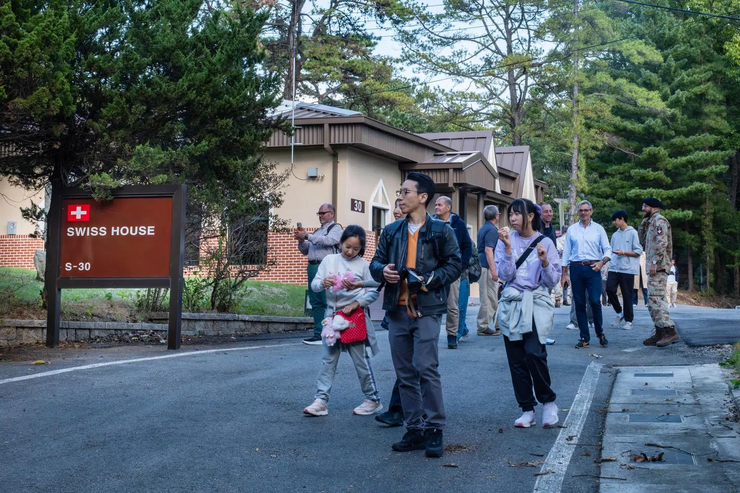 Visitors walk inside the Swiss Camp at the Neutral Nations Supervisory Commission (NNSC) facilities in Panmunjom, inside the DMZ (October 2024).