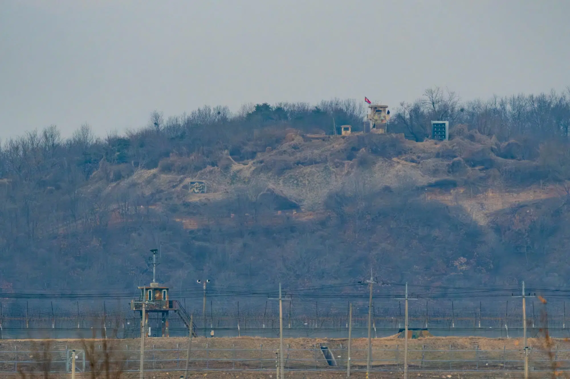 paju-imjingang-gp-dmz North Korea's first guard post (GP1) stands on the top of a hill at the western edge of the DMZ, overlooking a South Korean watch tower across the Imjin River.