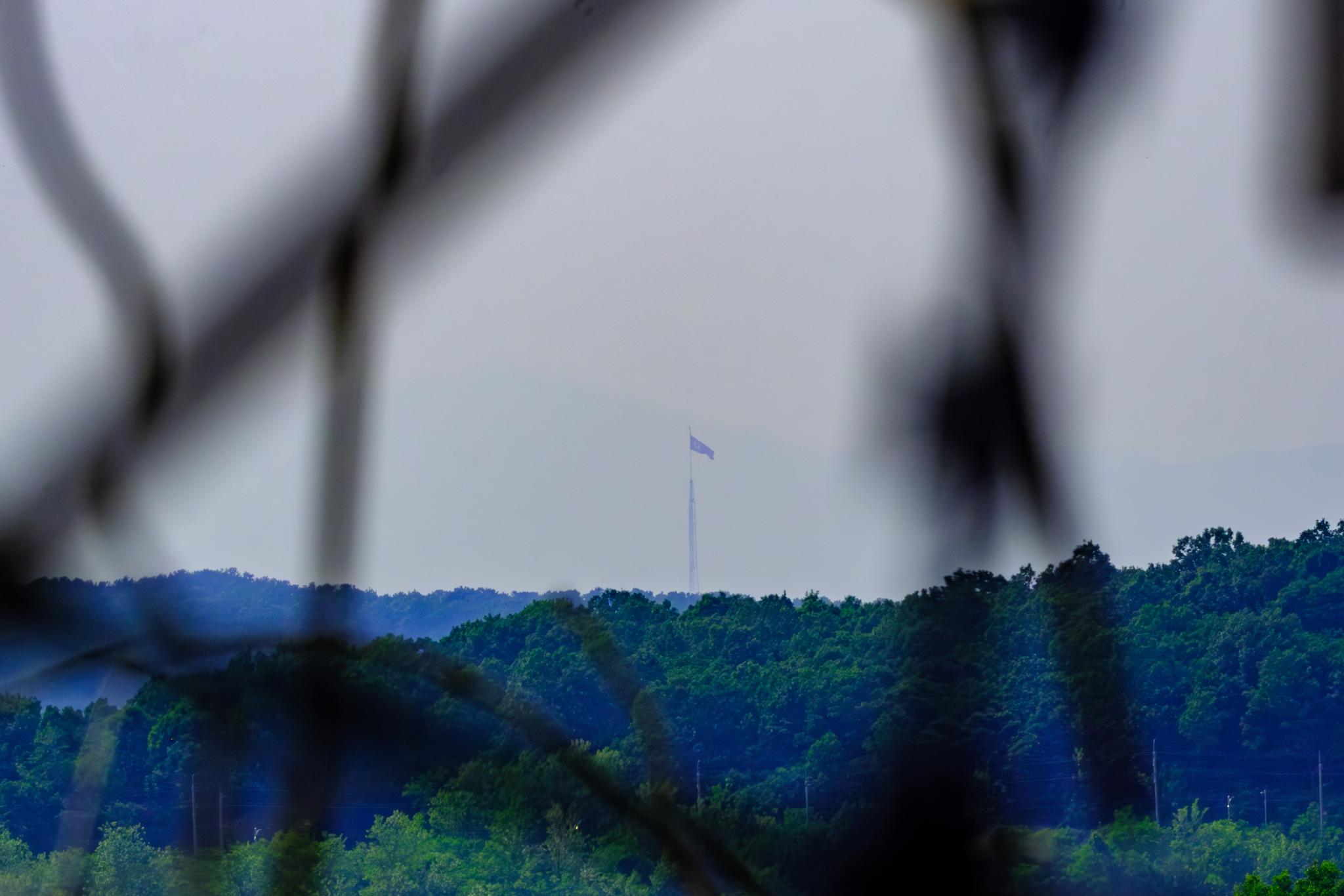 A giang North Korean flag flies at the top of a 160-meter high flagpole in Kijong-ri, inside the DMZ.
